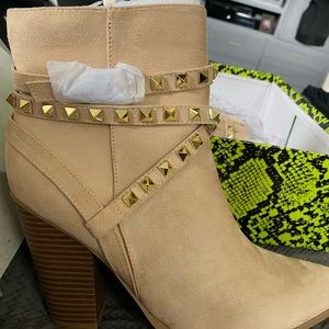 Brand new never worn studded boots size 10